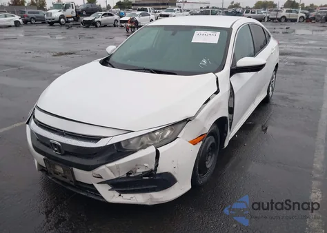 2017 Honda Civic Lx z USA, uszkodzony, nr VIN 19XFC2F54HE233110